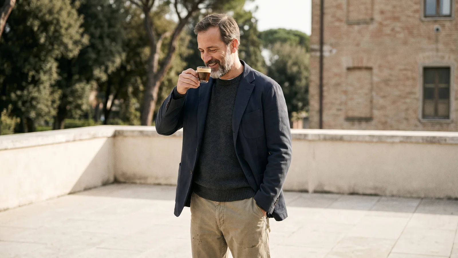 A man wearing comfortable business casual khakis and a button-down shirt in a relaxed everyday moment.