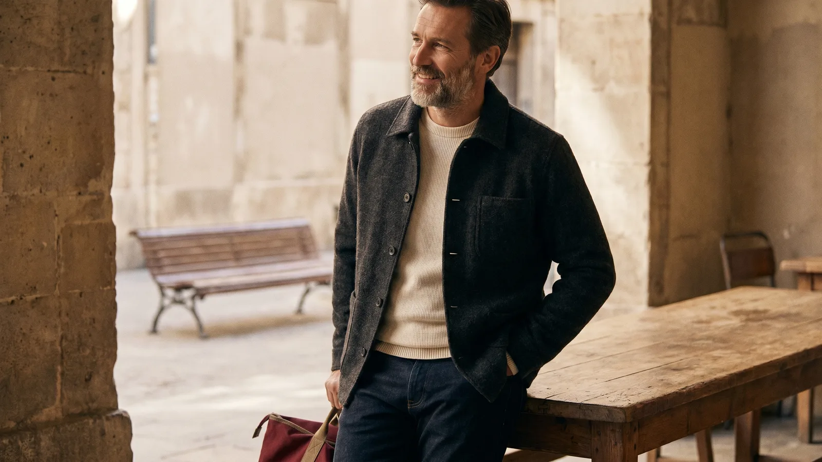 A man in comfortable layers models a relaxed casual smart look in an everyday setting.