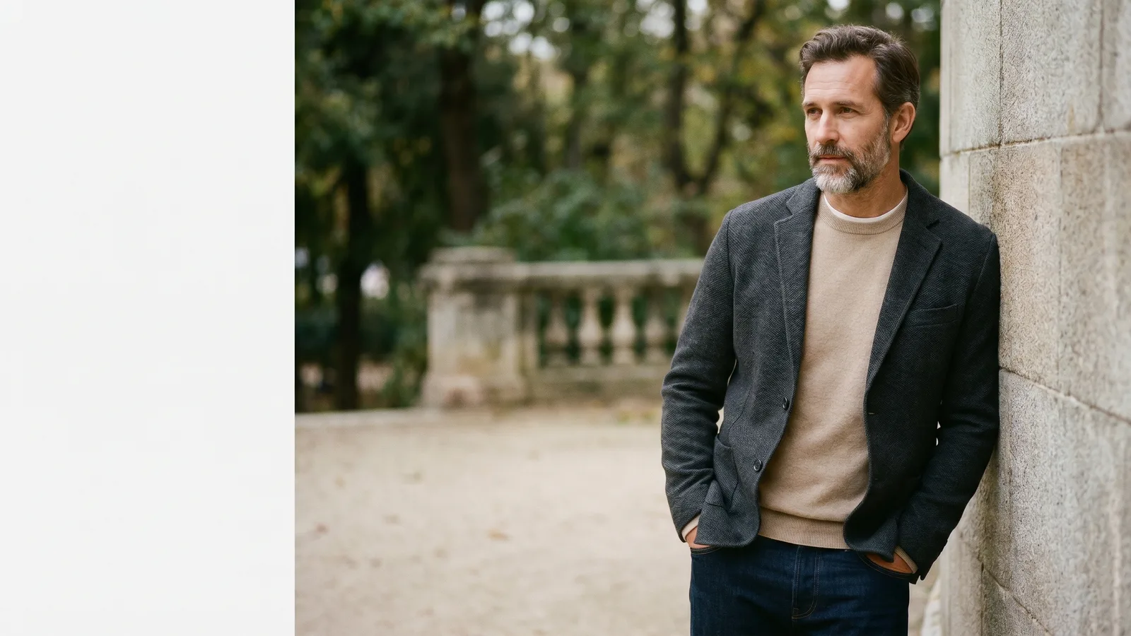 A man in a smart casual men's layered outfit walks naturally in an everyday setting.